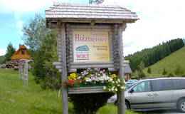 Signpost guesthouse Holzmeister